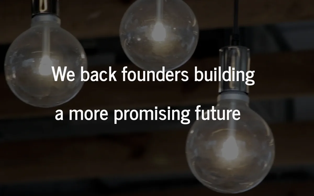 Samvid Ventures homepage — “We back founders building a more promising future” over hanging light bulbs